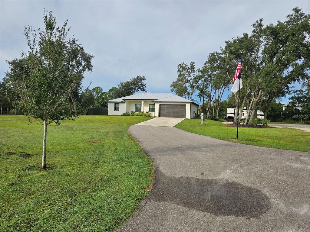 Photo of 7373 Gewant Boulevard, Punta Gorda, FL 33982 (MLS # A4665634)