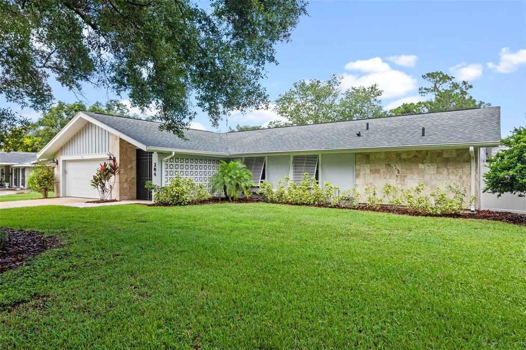 Photo of 204 Brom Bones Lane, Longwood, FL 32750 (MLS # O6348654)