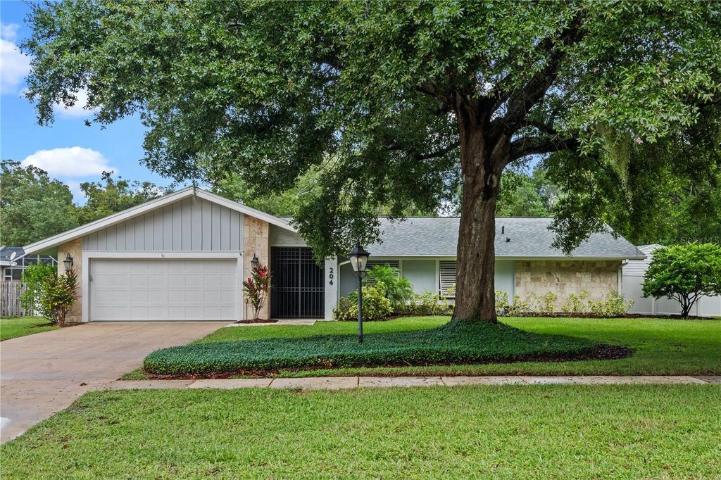 Photo of 204 Brom Bones Lane, Longwood, FL 32750 (MLS # O6348654)