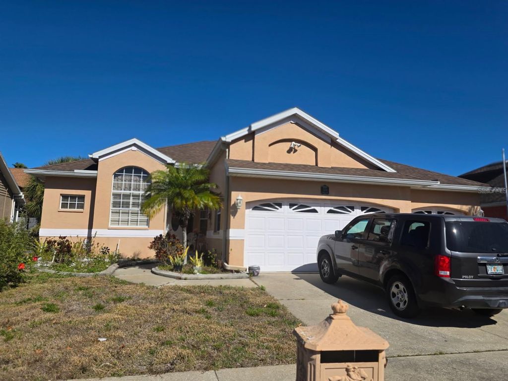 Photo of 324 Wood Dove Avenue, Tarpon Springs, FL 34689 (MLS # A4680604)