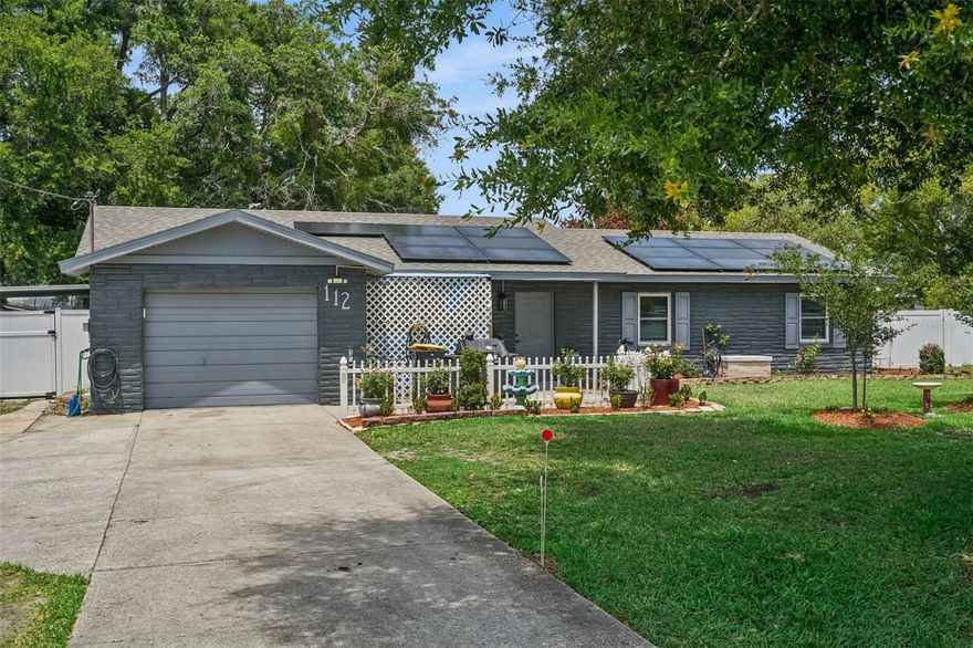 Welcome to 112 Lake Mattie Rd in Auburndale, a 3-bedroom, 2-bathroom home offering comfort, space, and flexibility on just over one-third of an acre. Ideal for first-time homebuyers, this property combines practical features with room to grow.

Step inside to a generously sized living area that flows seamlessly into the dining space and kitchen, creating an easy, open feel that’s perfect for everyday living and entertaining. All bedrooms are thoughtfully situated on one side of the home, offering convenience and a sense of privacy.

The primary suite features its own bathroom with a stand-alone shower, while the second bathroom includes a tub/shower combination to accommodate family or guests. A versatile flex room provides the perfect space for a home office, study, or den tailored to your needs.

Enjoy year-round relaxation in the enclosed porch. Outside, the fully fenced yard offers plenty of space for pets, play, or future enhancements, all set on a generous lot. Solar panels add energy efficiency and long-term savings, making this home as smart as it is inviting.

With its functional layout, added flexibility, and great outdoor space, this home is a fantastic opportunity to own in a peaceful Auburndale setting. Don’t miss your chance to make it yours.