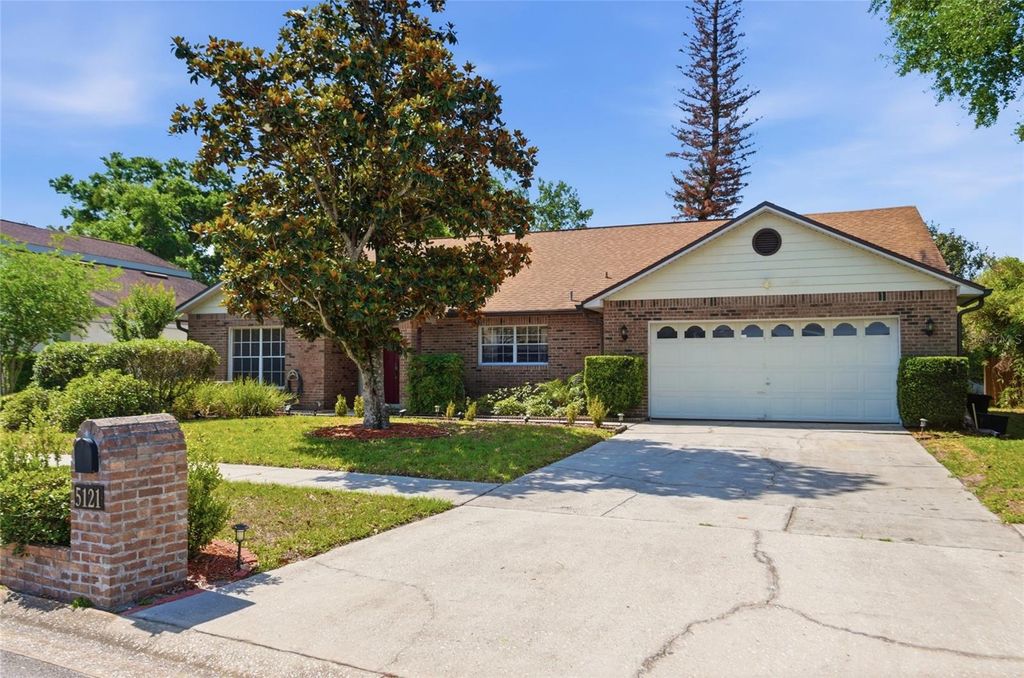 Photo of 5121 Stratemeyer Drive, Orlando, FL 32839 (MLS # O6402268)