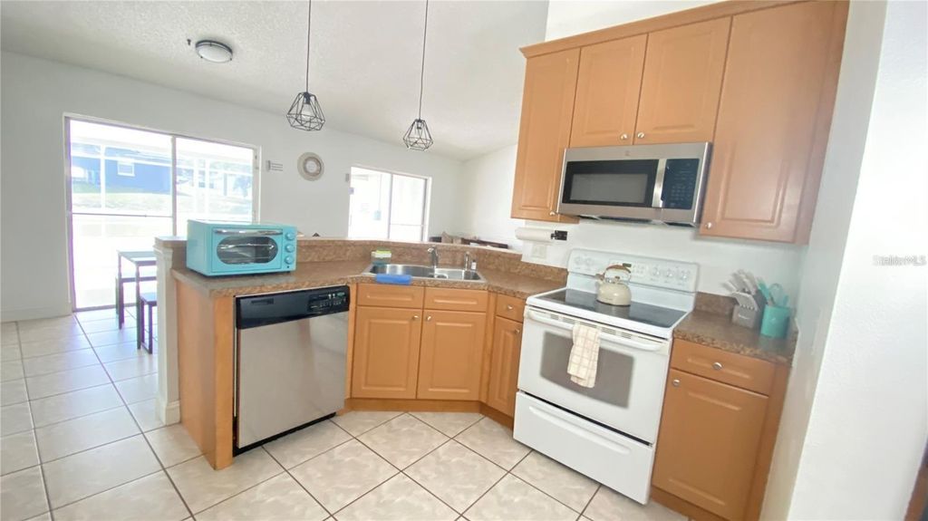 Photo of 1001 Lester Ridge Court, Kissimmee, FL 34747 (MLS # TB8454415)