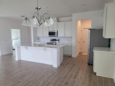 Tiny photo for 1864 Ross Hammock Avenue, Groveland, FL 34736 (MLS # O6345750)