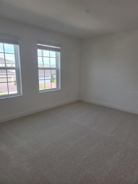 Tiny photo for 1864 Ross Hammock Avenue, Groveland, FL 34736 (MLS # O6345750)