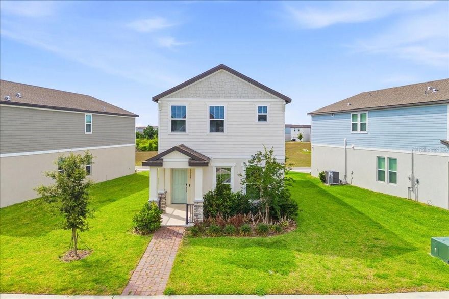 Beautiful and nearly new home in the quiet and friendly Highland Ridge community. This home was built only two years ago and is in perfect condition, offering over 2,114 sq. ft. of air-conditioned space. The layout is open and bright, with a modern kitchen that overlooks the large living and dining areas, perfect for family time and hosting friends. A big plus for this property is the oversized lot with no neighbors behind, giving you more space and total privacy. The house is energy-efficient. Highland Ridge is a great neighborhood with a community pool, parks and more. You are also in an amazing location, just 3 miles from Walt Disney World and very close to top schools, shopping, and restaurants. If you are looking for a newer home with more land and privacy in Winter Garden, It is also in a prime location within the community, situated on a quiet cul-de-sac with very little traffic, thisis the one!