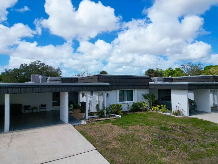 Now offered at a newly improved price, this 2-bedroom, 2-bath villa presents an outstanding opportunity in a highly desirable 55+ community, combining value, location, and low-maintenance living.

This light and bright home features an open living and dining area plus a versatile den ideal for a home office, hobby room, or additional guest space. The enclosed Florida room provides year-round enjoyment and added living space, perfect for relaxing or entertaining. A private laundry room with utility sink and extra storage adds convenience.

Recent updates provide peace of mind and enhance overall appeal. The spacious primary suite includes a walk-in closet and an en-suite bathroom with an accessible shower. The guest bedroom is well-suited for visitors while maintaining flexibility for everyday use.

Residents enjoy resort-style amenities including a heated pool, fitness center, clubhouse, shuffleboard, library, and an active social calendar. This welcoming community offers a true Florida lifestyle with strong neighbor connections.

Located just minutes from downtown Sarasota, Siesta Key Beach, shopping, dining, hospitals, and arts and culture. Bobby Jones Golf Club is just blocks away, featuring a recently renovated course and modern facilities.

Ideal as a full-time residence, seasonal home, or investment opportunity, this villa delivers exceptional value at its new price point in one of Sarasota’s most convenient locations.