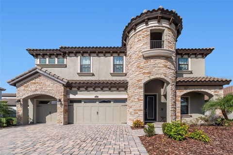 Photo of 10863 Rustic Timber Loop, San Antonio, FL 33576 (MLS # TB8518926)