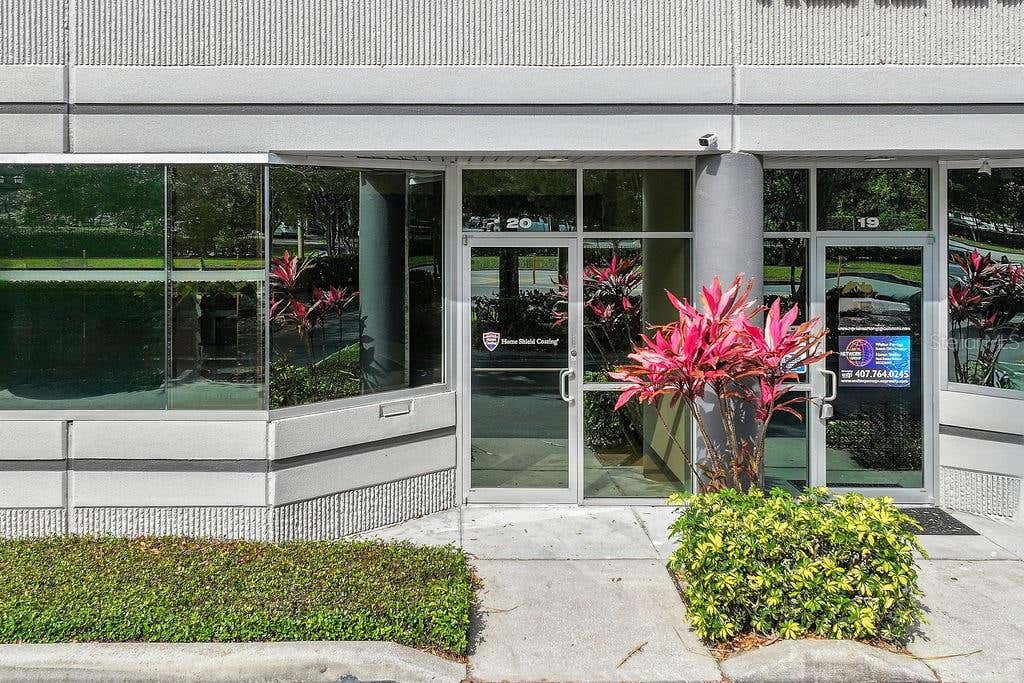Photo of 7901 Kingspointe Parkway #20, Orlando, FL 32819 (MLS # O6432715)