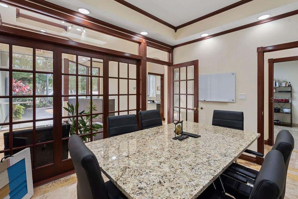 Photo of 7901 Kingspointe Parkway #20, Orlando, FL 32819 (MLS # O6432715)