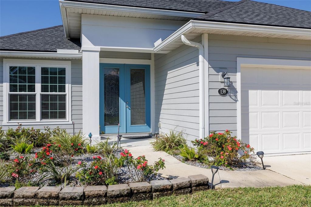 Photo of 139 Wood Stork Lane, Palm Coast, FL 32164 (MLS # FC317261)