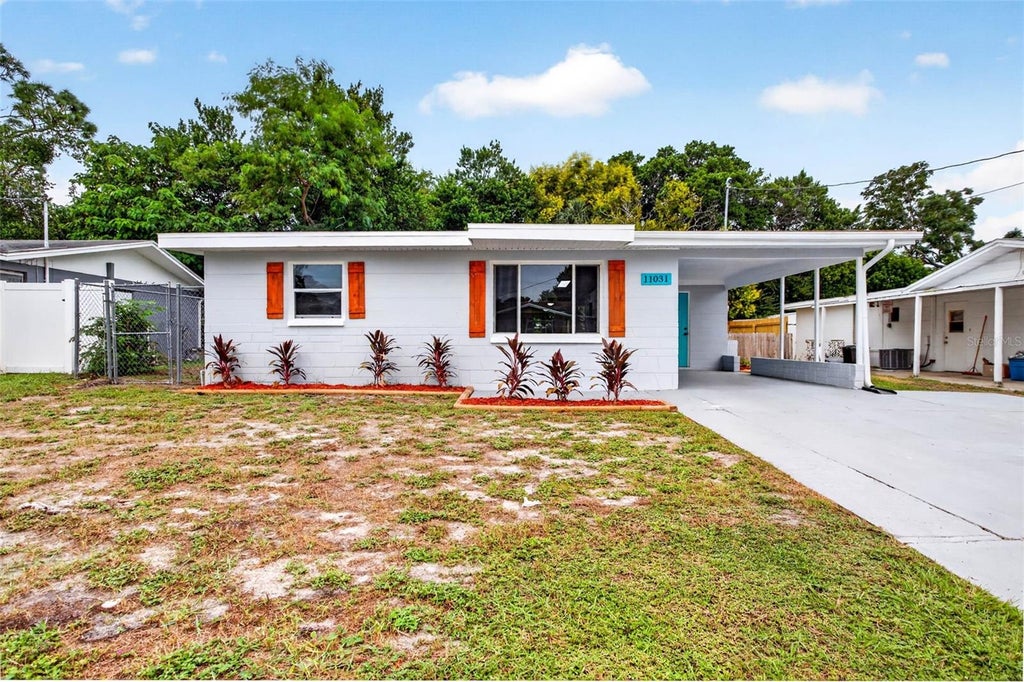 Photo of 11031 Hassle Avenue, Port Richey, FL 34668 (MLS # W7890072)