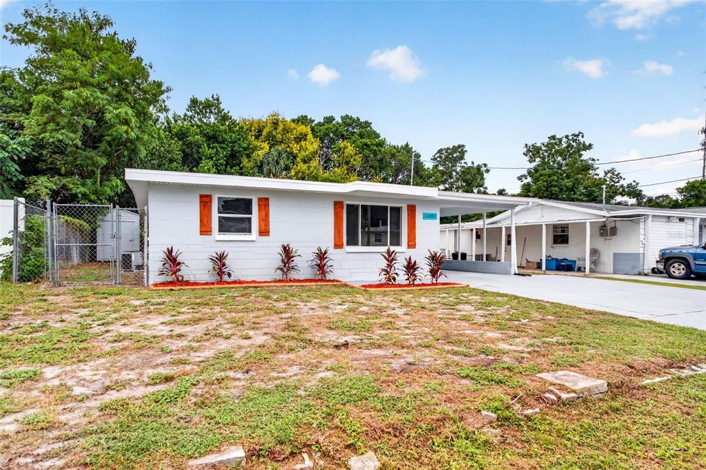 Photo of 11031 Hassle Avenue, Port Richey, FL 34668 (MLS # W7890072)