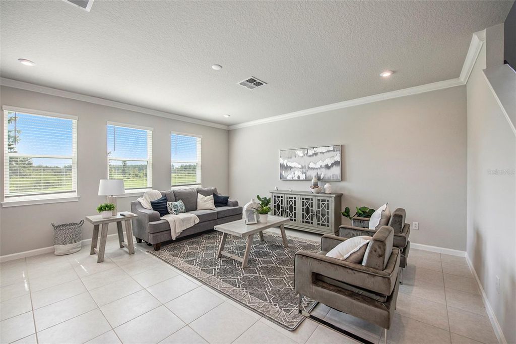 Photo of 2326 Village Amble Loop, Lutz, FL 33558 (MLS # TB8480848)