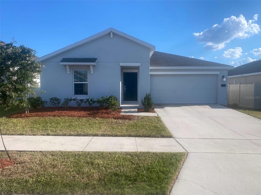 Photo of 656 Tanaro Lane, Haines City, FL 33844 (MLS # O6445914)