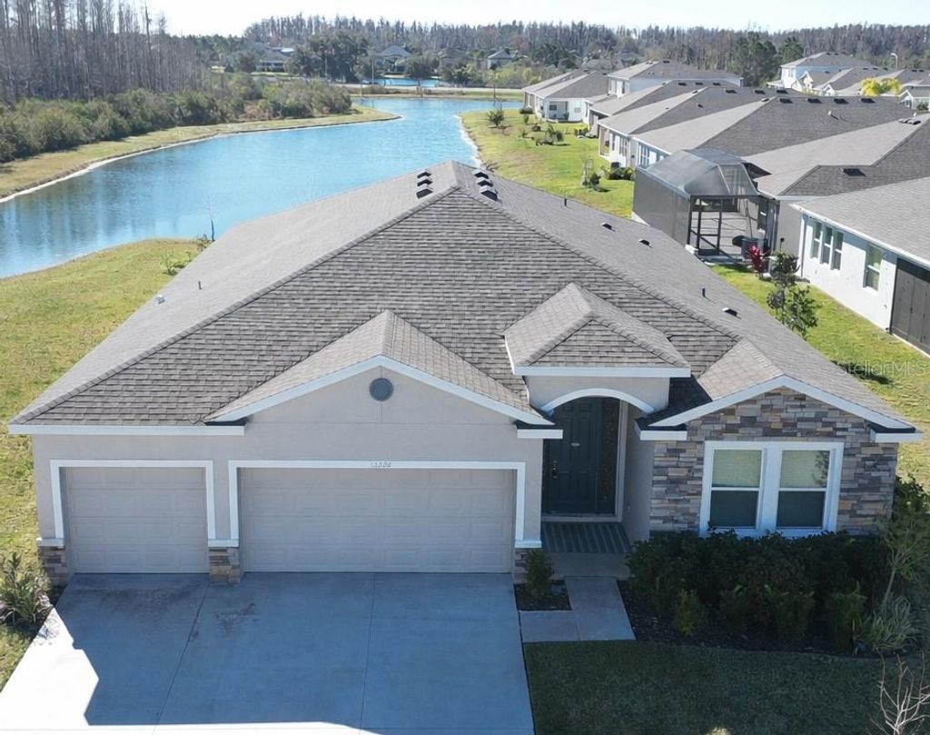 Photo of 32226 Eldorado Canyon Loop, Wesley Chapel, FL 33543 (MLS # W7878886)