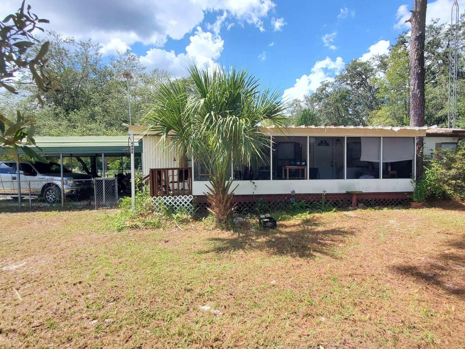 Charming 3-Bedroom, 2-Bath Doublewide on Half an Acre in Crystal River!
Discover the perfect blend of comfort, convenience, and country living in this cozy 3-bedroom, 2-bathroom doublewide home, boasting 1,248 sq ft of well-designed living space. Situated on a spacious half-acre corner lot, this property offers plenty of room for your toys, RVs, and outdoor adventures.
Step inside to a warm and inviting interior featuring a fireplace and an open layout perfect for family living or entertaining. The home is move-in ready, including a recently replaced AC and a durable metal roof, ensuring peace of mind for years to come.
Outside, enjoy a fully fenced yard, an attached carport, and a large shed for all your storage needs. Benefit from well water, meaning no monthly water bills, and revel in the freedom of no HOA or deed restrictions.
Located just minutes from downtown Crystal River, you’ll have easy access to dining, shopping, beautiful springs, outdoor recreation, and the Gulf Coast. This is the ideal home for those seeking a quiet, rural lifestyle without sacrificing convenience.
Don’t miss your chance to make this charming Crystal River property your own!