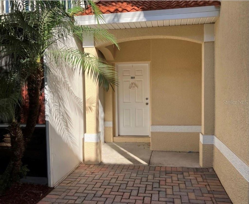 Photo of 21019 Sunpoint Way #201, Lutz, FL 33558 (MLS # S5131433)