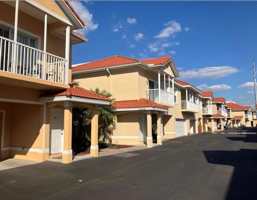 Photo of 21019 Sunpoint Way #201, Lutz, FL 33558 (MLS # S5131433)