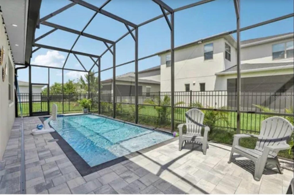 Photo of 2853 Willowseed Lane, Saint Cloud, FL 34772 (MLS # O6453295)