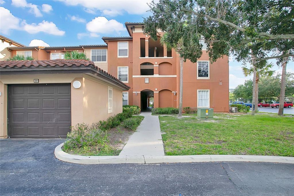 Photo of 5554 Metrowest Boulevard #112, Orlando, FL 32811 (MLS # O6389911)