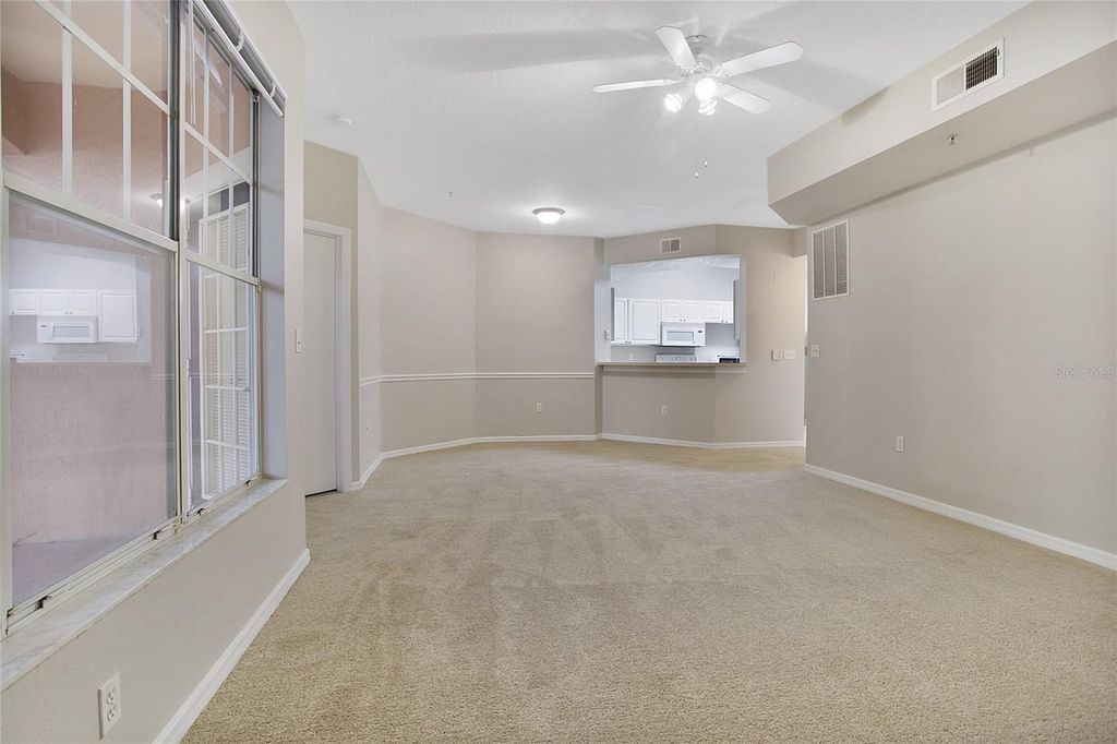 Photo of 5554 Metrowest Boulevard #112, Orlando, FL 32811 (MLS # O6389911)