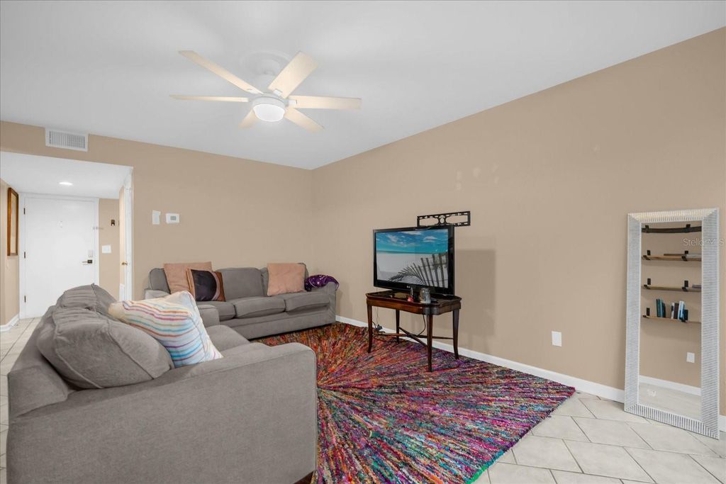 Photo of 5842 Peregrine Avenue #C01, Orlando, FL 32819 (MLS # O6374467)