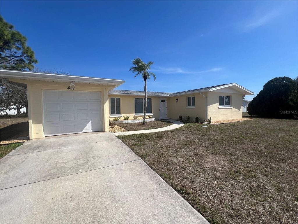 Photo of 421 Adams Court NW, Port Charlotte, FL 33952 (MLS # C7521564)