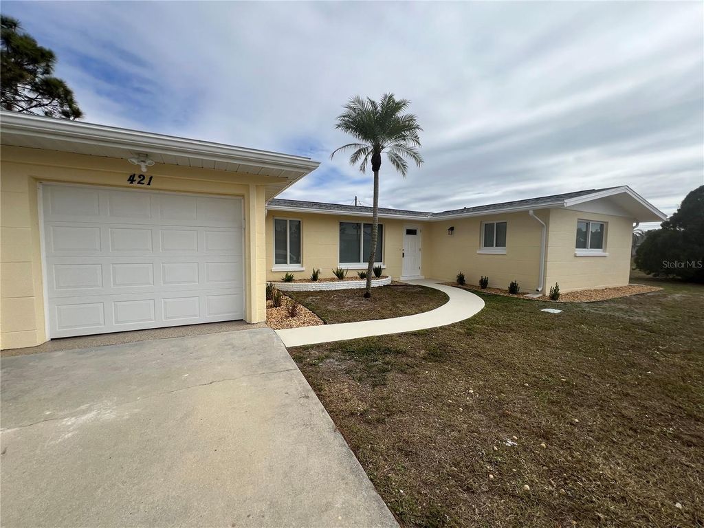 Photo of 421 Adams Court NW, Port Charlotte, FL 33952 (MLS # C7521564)