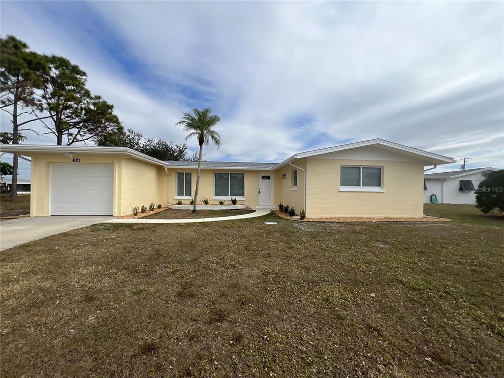 Photo of 421 Adams Court NW, Port Charlotte, FL 33952 (MLS # C7521564)