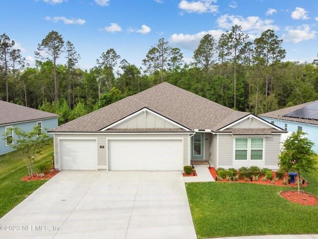 Photo of 70 Oakleaf Way, Palm Coast, FL 32137 (MLS # FC317324)