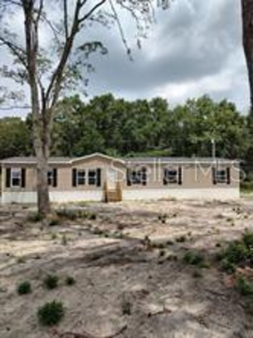 OWNER FINANCING AVAILABLE for this great Archer Florida location. 2023, 5 Bedroom, 3 bathroom, appx 1898 Sq. Ft. of H/A on One Acre Lot on Archer Road, Archer FL. This 1-acre property is located in a fast-growing area with access to Shopping, Banking, and UF Health Pediatrics Facility at the Tower Square Shopping Center. Close proximity to Elementary, Middle, and High Schools and only minutes away from The Oaks Mall, Haile Plantation, Kanapaha Botanical Gardens, and Tower Road. A zoning change to commercial and the great exposure to Archer Road is a plus for a new owner looking to locate a thriving business! Don't miss out on this opportunity to grow in a thriving area within minutes of Gainesville and the University OF Florida