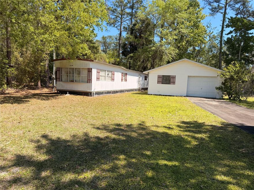 Don’t miss this cute 1973 single-wide manufactured home offering 2 bedrooms and 1 bathroom with a detached garage that provides plenty of room for parking, storage, or a workshop. Situated on a quiet road in the desirable Astor Forest Campsites community, this property offers a peaceful setting with a partially fenced yard perfect for pets or outdoor enjoyment. For just $40  you can join the AFPOA and enjoy access to the private boat ramp, making it easy to spend your days fishing, boating, and exploring the beautiful St. Johns River. Whether you’re looking for a weekend getaway, snowbird retreat, investment opportunity, or affordable full-time living, this property offers great potential and laid-back Florida living.
