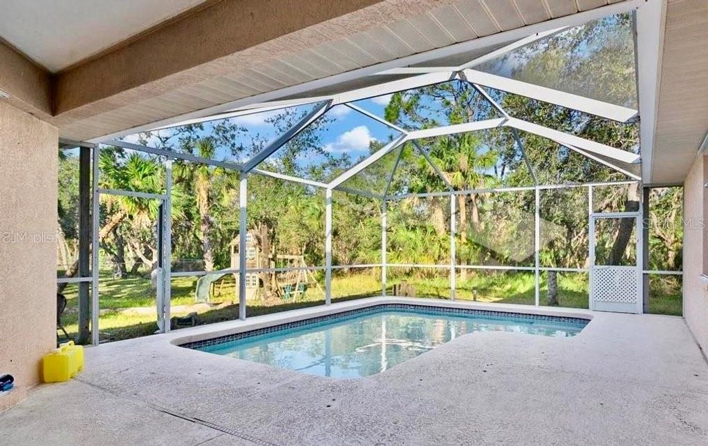Photo of 2842 Dumont Lane, North Port, FL 34286 (MLS # A4666473)