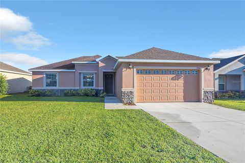 Photo of 33840 Emerald Pond Loop, Leesburg, FL 34788 (MLS # O6348198)