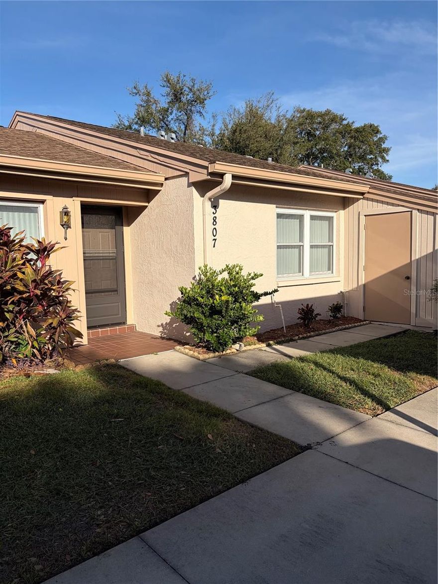 Come join this 55+ community and all the amenities it has to offer including clubhouse, pool area and shuffleboard courts. This ground level unit comes with parking out front of unit and an outside storage. Kitchen has been updated and comes with washer and dryer. The large step down sun room has  plenty of light for reading or shut the blinds for privacy. This unit offers split bedrooms and 2 full baths.  Omnunity is close to shopping, restaurants and the many beaches along the coast.