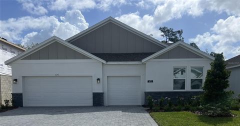 Photo of 671 Birdswill Lane, Deland, FL 32724 (MLS # O6396630)