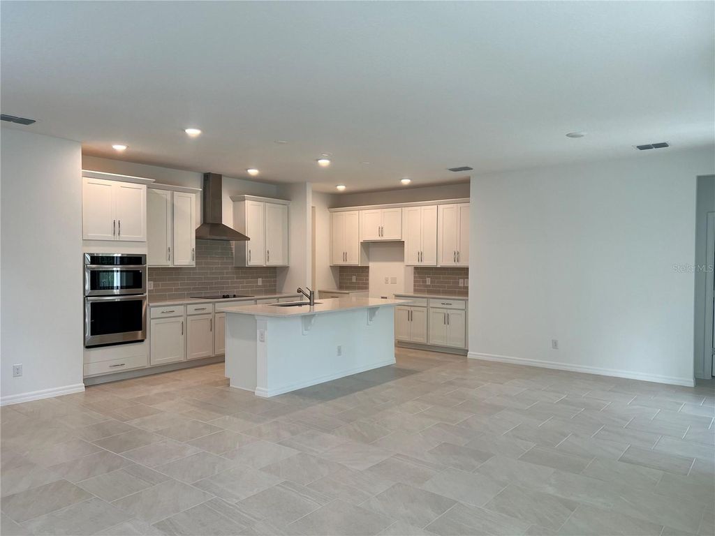 Photo of 671 Birdswill Lane, Deland, FL 32720 (MLS # O6396630)