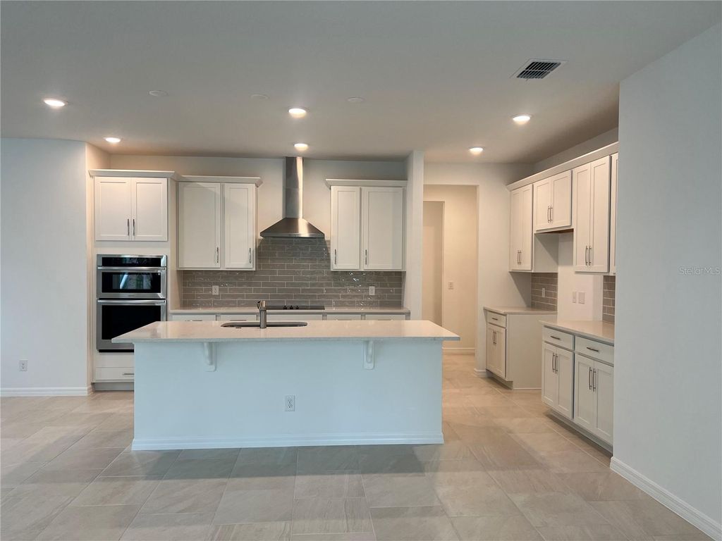 Photo of 671 Birdswill Lane, Deland, FL 32720 (MLS # O6396630)