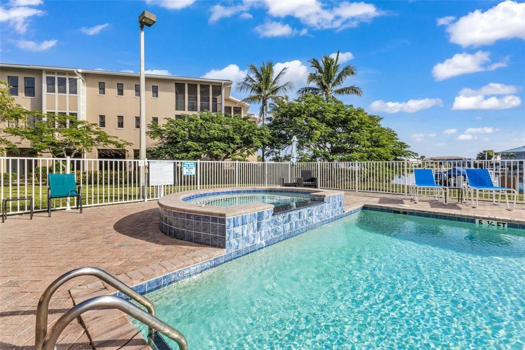 Photo of 3322 Purple Martin Drive #125, Punta Gorda, FL 33950 (MLS # C7531531)