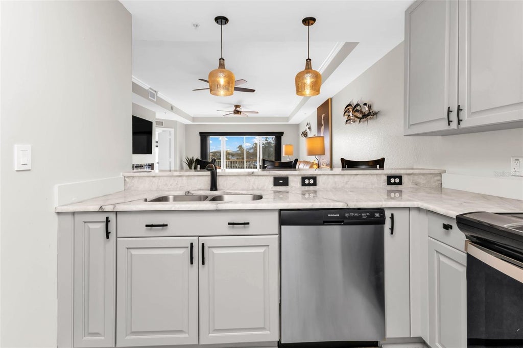 Photo of 3322 Purple Martin Drive #125, Punta Gorda, FL 33950 (MLS # C7531531)