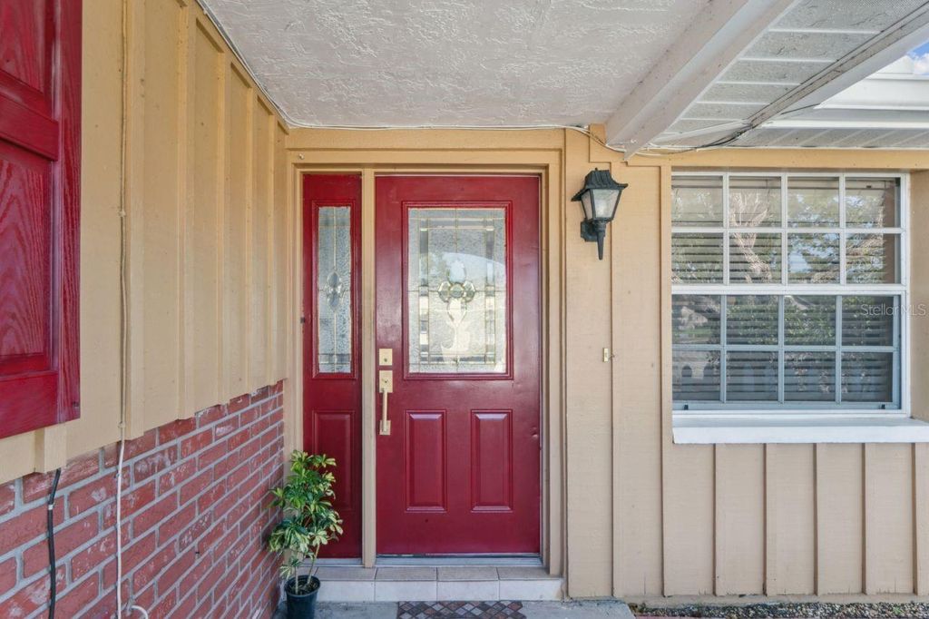 Photo of 5820 Melaleuca Drive, Holiday, FL 34690 (MLS # W7881373)