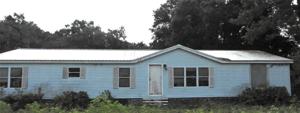 Photo of 10397 NW Gainesville Road, Ocala, FL 34482 (MLS # OM729814)