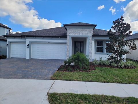 Photo of 7662 Hemlock Seed Drive, Wesley Chapel, FL 33545 (MLS # J983230)