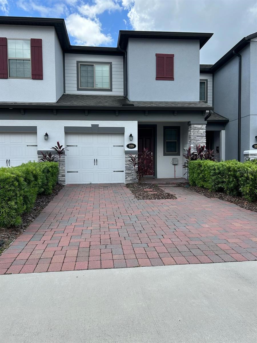 A beautiful townhome with 3 bedrooms, 2.5 bathrooms, and a 1-car garage with a 2-car wide paver driveway. First Floor has open-concept great room / kitchen combination. A powder bath and storage closet are conveniently located just off the kitchen. Second Floor has large owner's retreat with a nice walk-in closets and an impressive en-suite bath. This room features dual sinks on an extended vanity, a garden tub and a separate shower. 2 separate bedrooms are located to the rear of the home and share a bath located in the main hall, along with the washer / dryer. This home is located in a gated community. Easy access to shopping and highways.