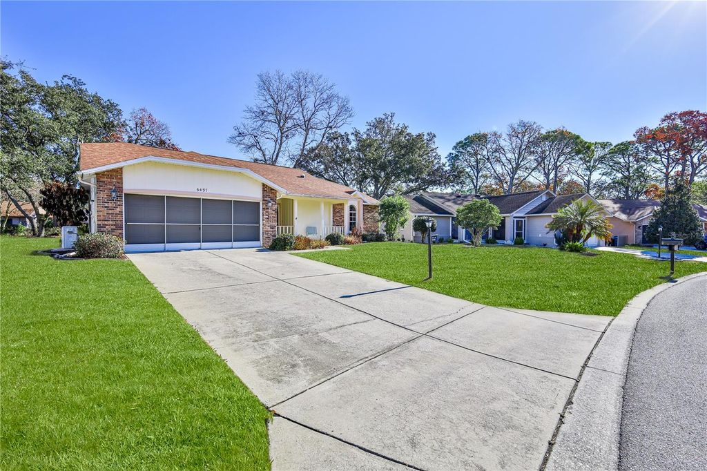 Photo of 6497 Pine Meadows Drive, Spring Hill, FL 34606 (MLS # W7882698)