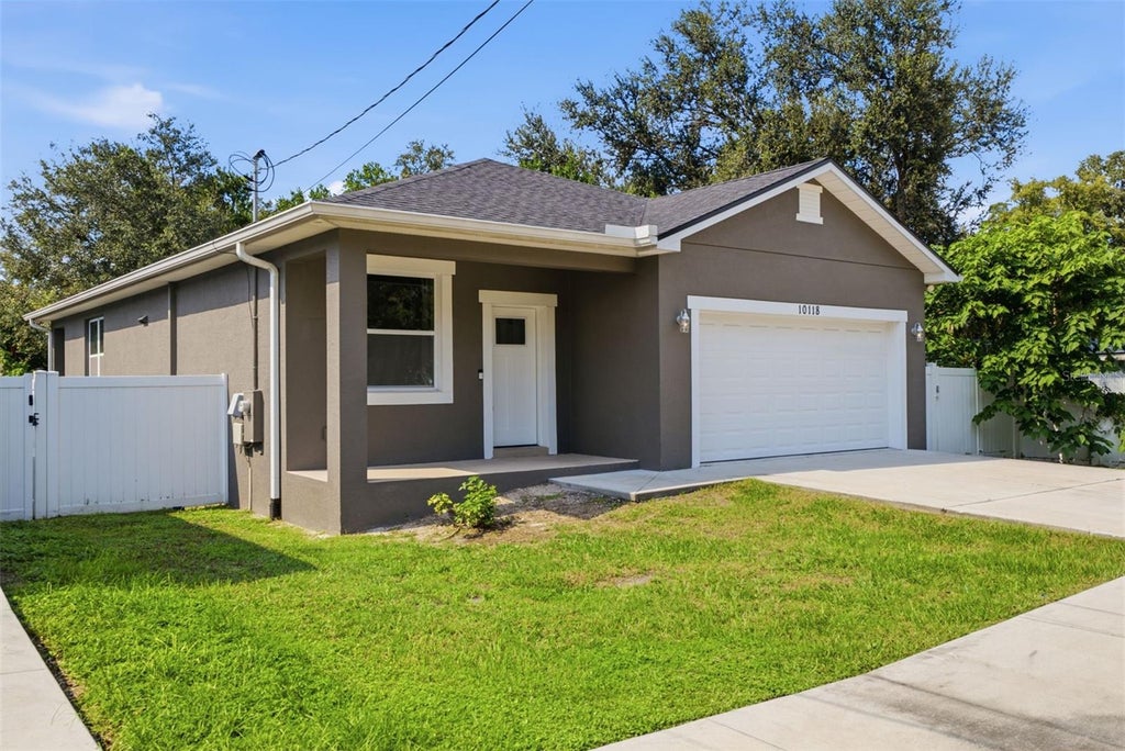 Photo of 10118 N Brooks Street, Tampa, FL 33612 (MLS # TB8561311)