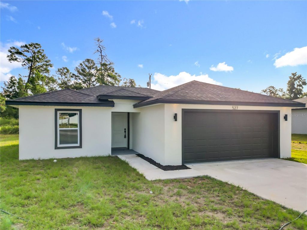 Photo of 527 Marion Oaks Lane, Ocala, FL 34473 (MLS # O6364863)