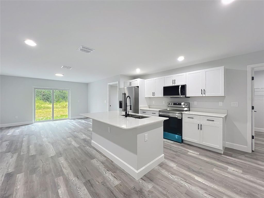 Photo of 527 Marion Oaks Lane, Ocala, FL 34473 (MLS # O6364863)