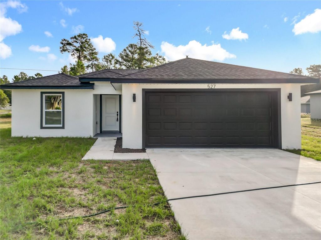 Photo of 527 Marion Oaks Lane, Ocala, FL 34473 (MLS # O6364863)